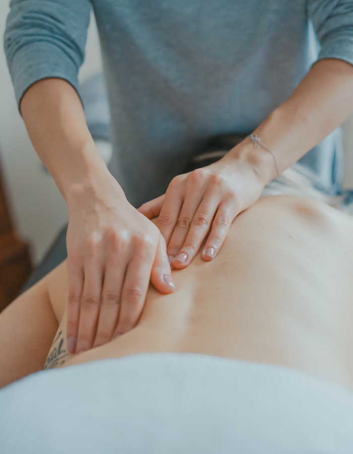Therapist providing shoulder treatment